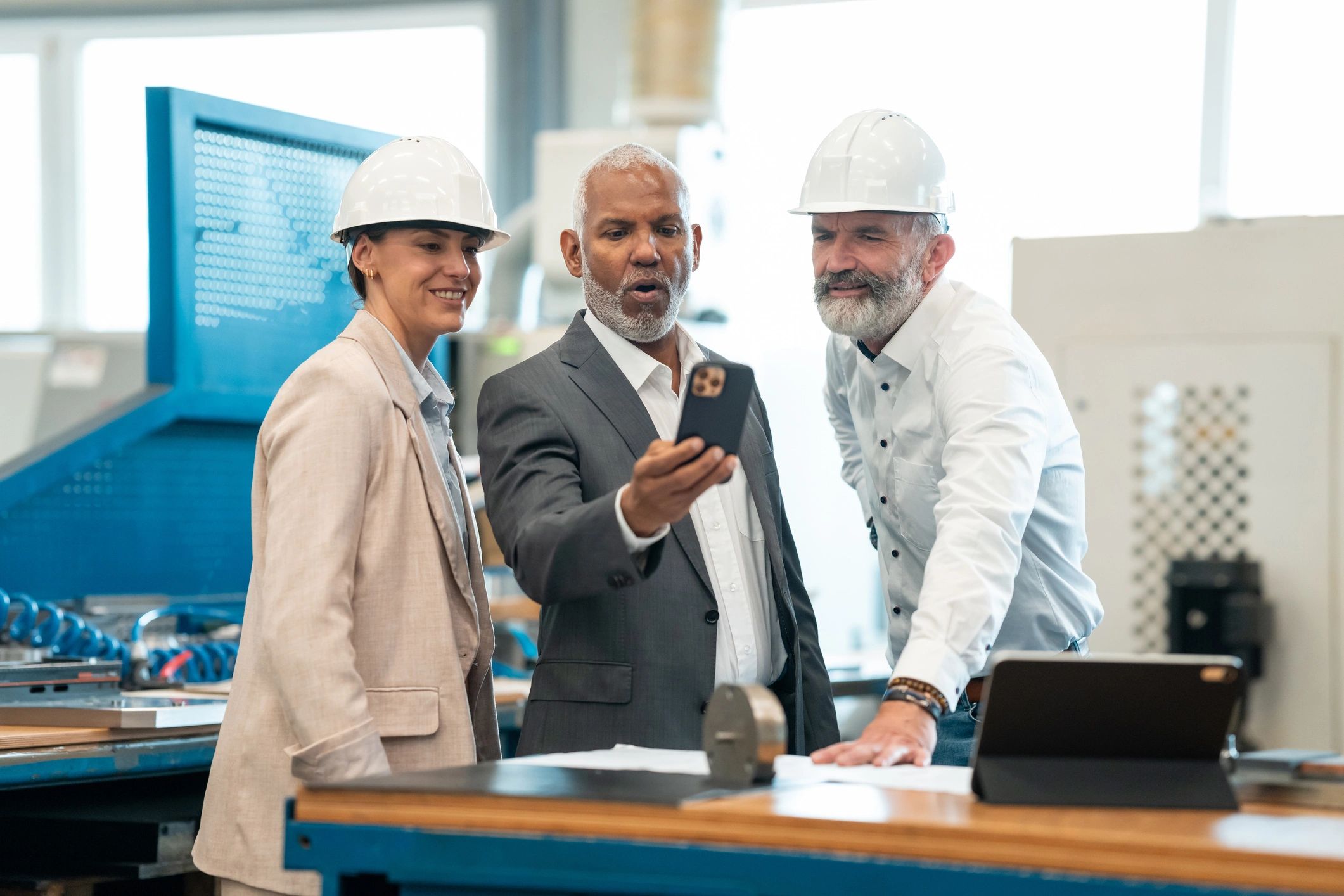Business team reviewing production and supply plans